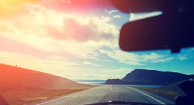 Driving a car on mountain road. Nature Norway. Polar circle. The way to Nordkapp
