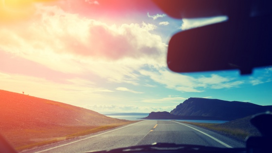 Driving a car on mountain road. Nature Norway. Polar circle. The way to Nordkapp
