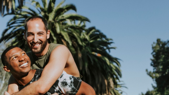 male gay couple outside